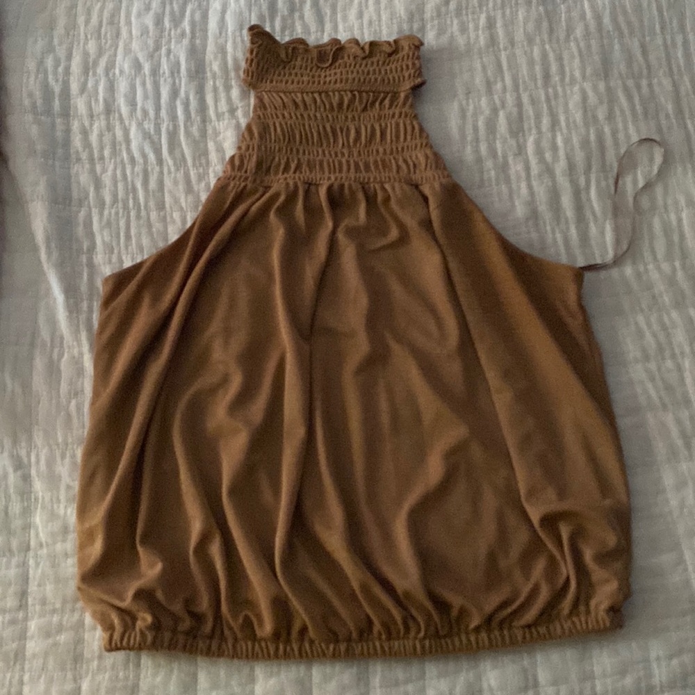 Gold sleeveless shirt